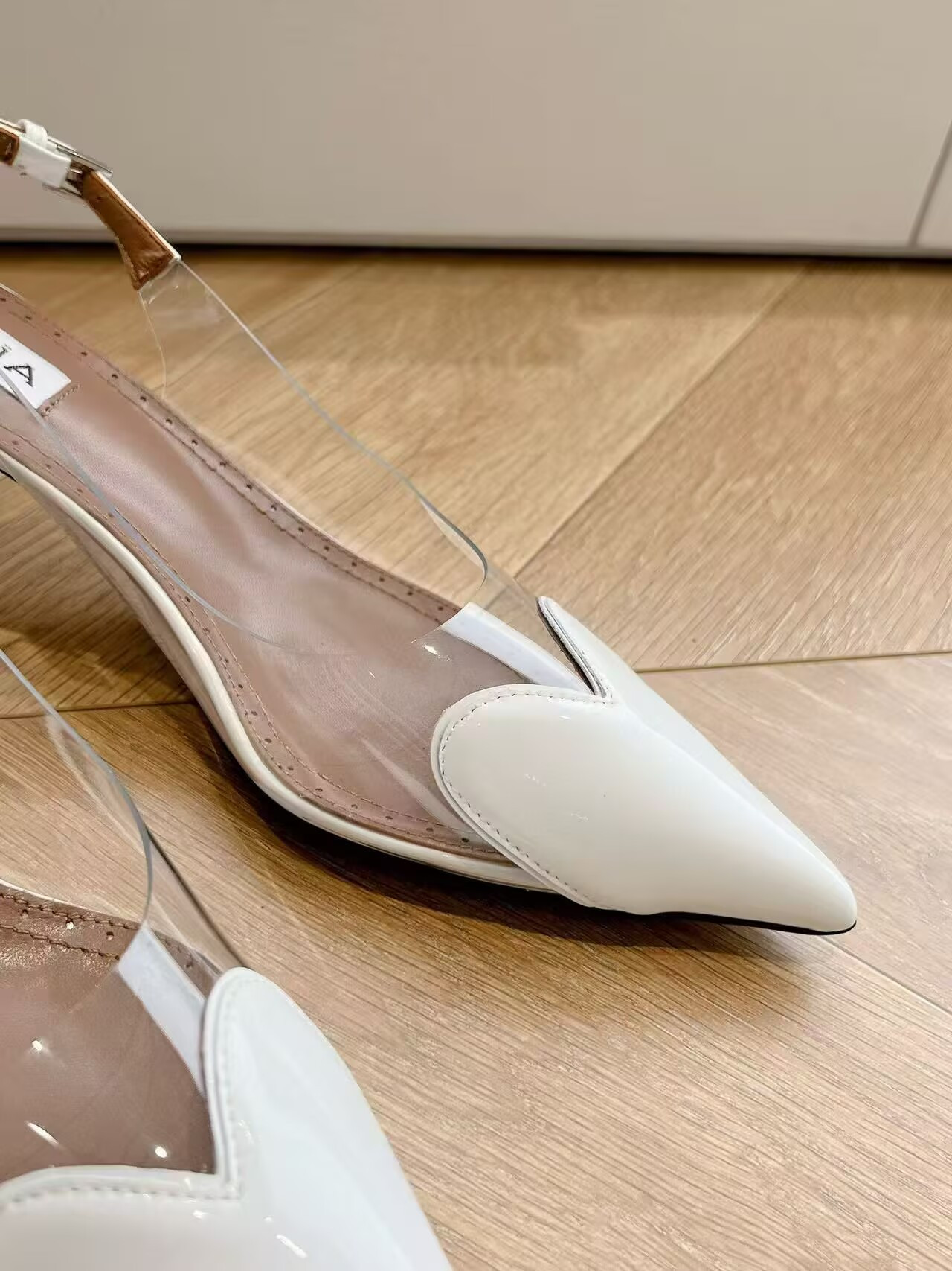 UA ALAÏA Le Coeur Plexi Heart-Toe Slingback Pump