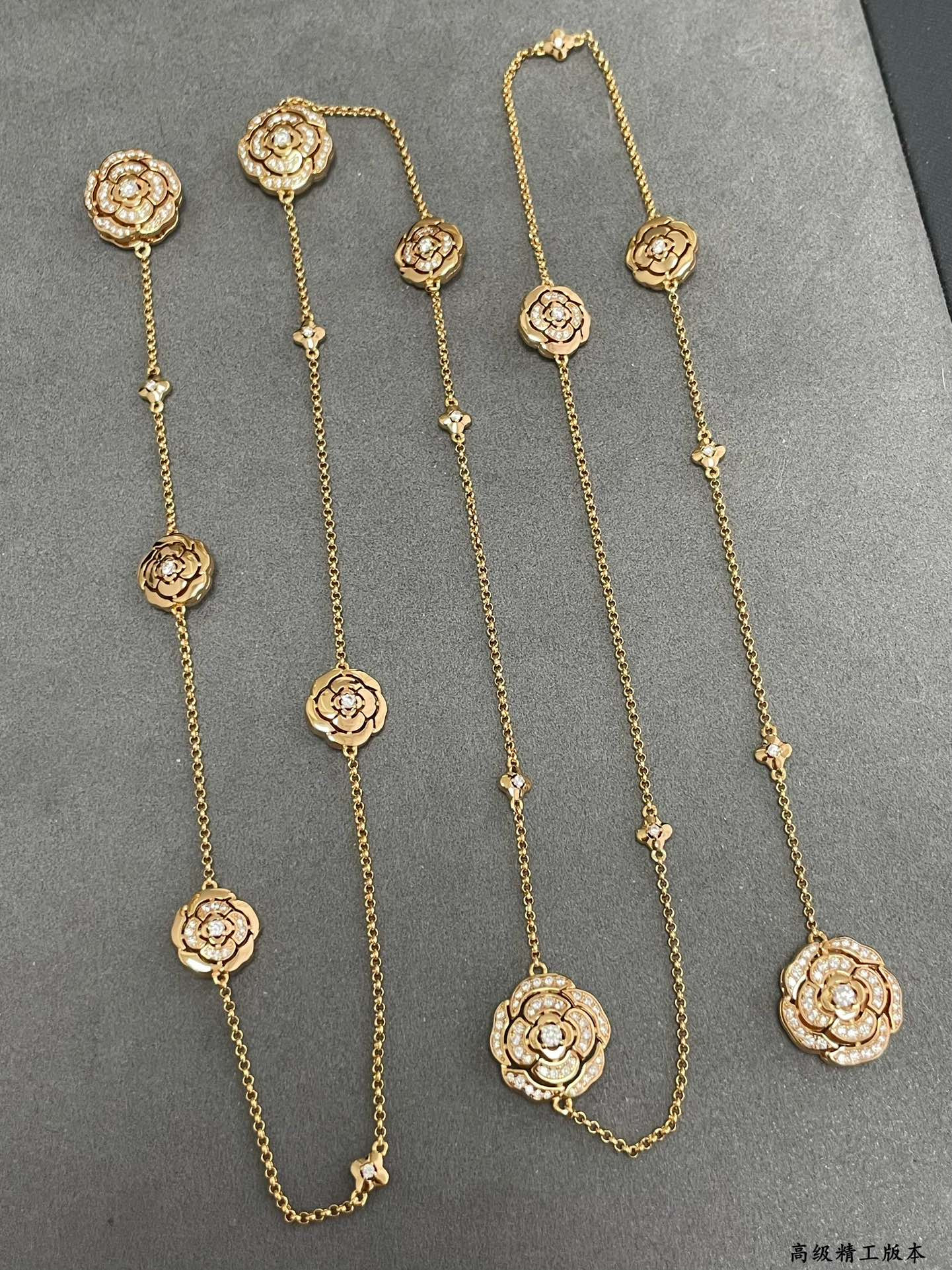 Ch*el camellia sweater necklace