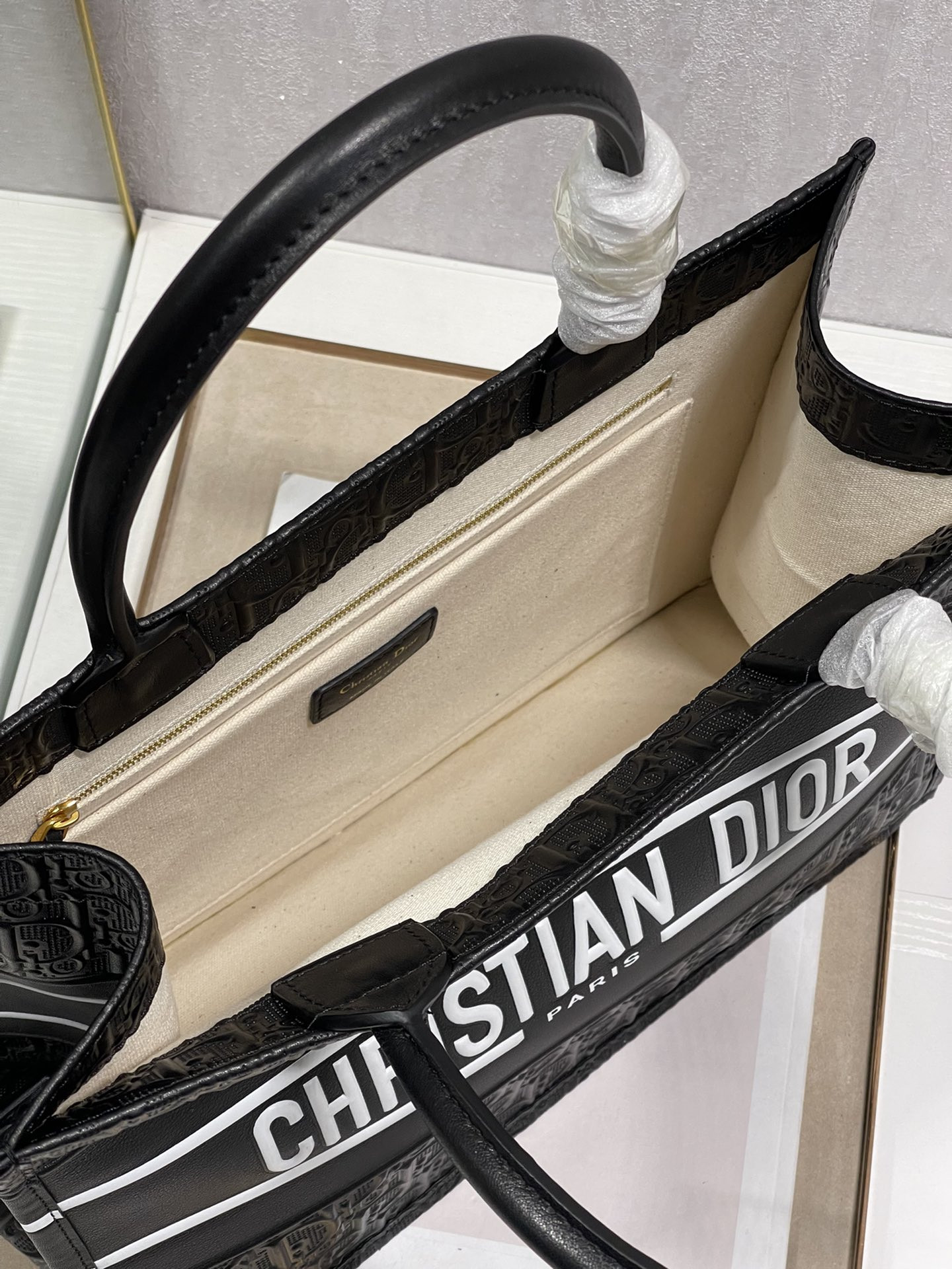 calfskin embossed medium D*or book tote black white 14 x 11 x 6.5 inches