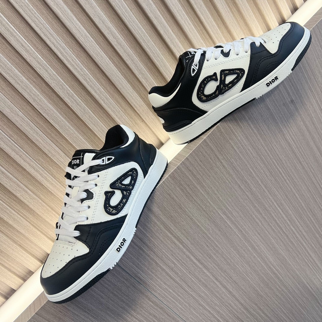 ua D*or b57 low-top sneaker black and white