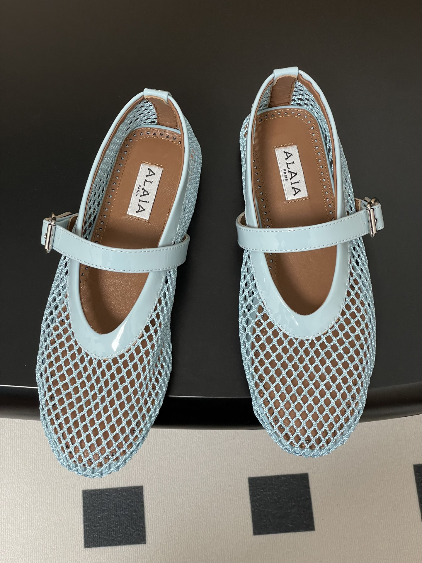UA ALAÏA BALLET FLATS IN FISHNET